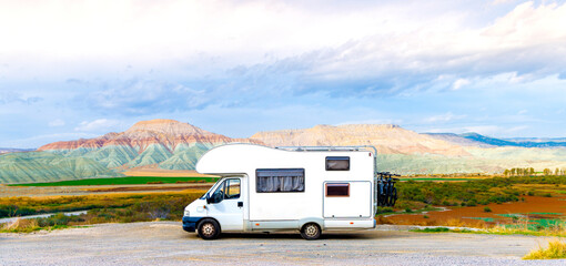 Camper parked at colored mountain in Turkey