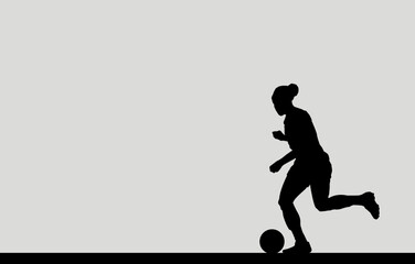 Silhouette of a female soccer player, isolated on a gray background.
