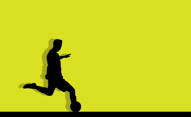 Fototapeta na wymiar Soccer player silhouette isolated on a green background