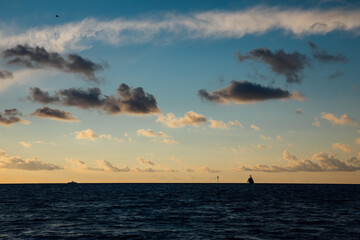 Fototapeta na wymiar ship at sea at sunset sea voyage beautiful nature