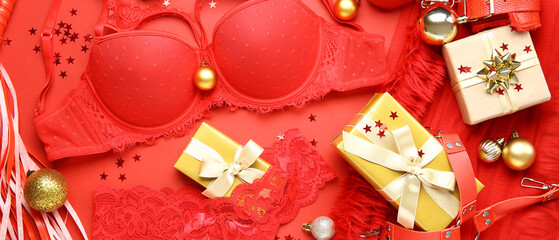 Sexy female underwear and Christmas gifts on red background