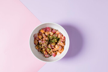 The image is a plate of healthy food, including a mixture of legumes.
