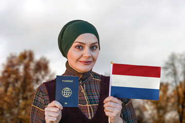 Muslim Woman Holding Passport and Flag of Netherlands