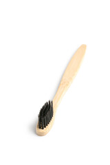 Bamboo toothbrush on white background