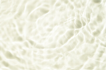 Summer sea natural background Beige surface, clear water with ripples and splashes. water waves in sunlight The water surface has waves.