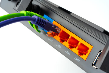 Modern router with cables plugged in close up