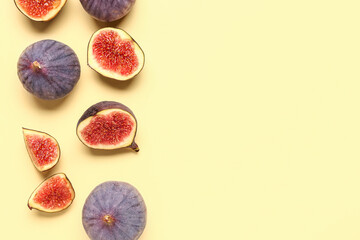 Fresh ripe figs on yellow background