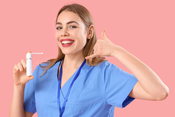 Female doctor with spray bottle showing 