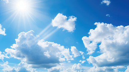 Naklejka na ściany i meble Background of blue sky and white clouds with the sun