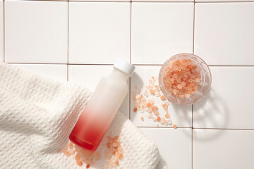 Cosmetic mockup for advertising. Pink salt is commonly used in the beauty industry. Minimalist...