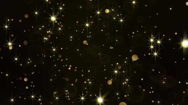Looping video gold star glow particles background. Bokeh gold glittering celebration. 4K resolution video 3840x2160