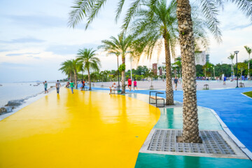 Blurred image of people exercising in the park.