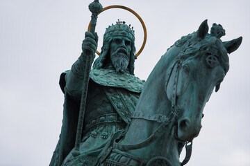 Bronze statue of Stephen I on horse, known as King Saint Stephen (Hungarian: Szent István király) at Fisherman's Bastion (Hungarian: Halászbástya). Budapest, Hungary - 7 May, 2019 - obrazy, fototapety, plakaty