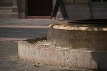 Old stone fountain in the historic center of Budapest, Hungary - 7 May, 2019