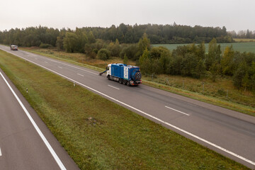Fototapeta na wymiar Drone photography of truck removing road signs in a highway