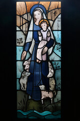 Orval trappist abbey, Belgium. Stained glass. Virgin and child with lambs