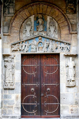 Fototapeta na wymiar Notre Dame du Port basilica, Clermont-Ferrand, France. South gate.