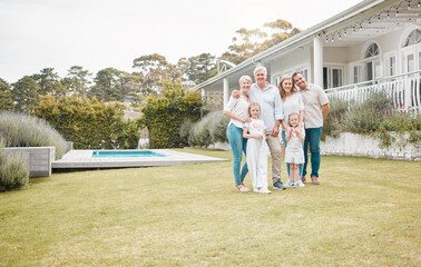 Portrait, real estate and a family in the garden of their new home together for a visit during summer. Children, parents and happy grandparents in the backyard for property investment with space