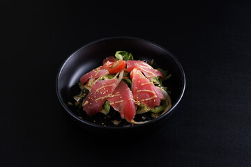 Japanese salad isolated in black background