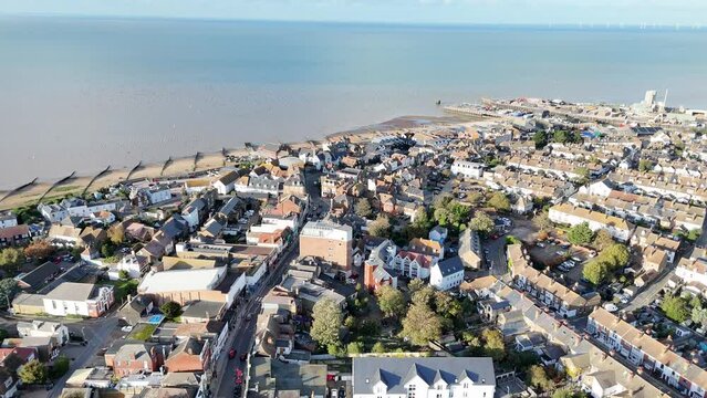 Whitstable seaside town  Kent UK pull back drone aerial reverse reveal