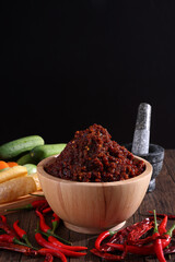 pork shrimp chilli dip local thai food sauce isolated in wood background