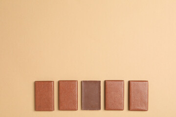 Brown chocolate bars on a light background