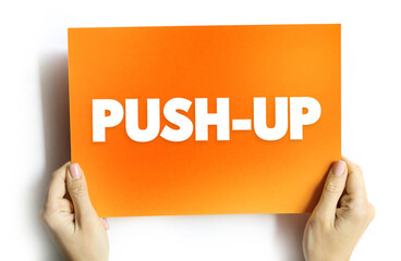 Push-up is a common calisthenics exercise beginning from the prone position, text concept on card...