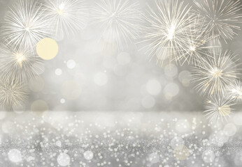 Fireworks with bokeh lights on grey background with copy space for text. Happy New Year holidays background