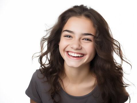 Beautiful teenage girl laughing. Full mouth smile. Isolated on white background
