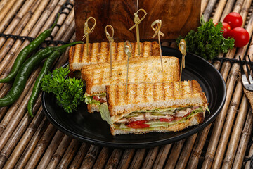 Club sandwich with chicken cheese and salad