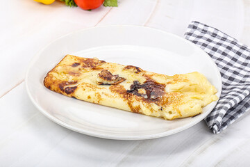 Sweet pancake with banana and honey