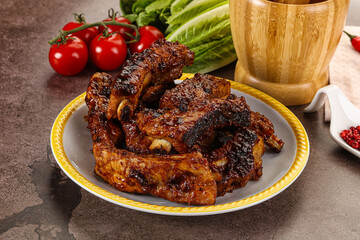 Grilled pork ribs in barbecue sauce