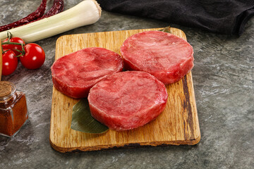 Delicous raw tuna medallion for cooking