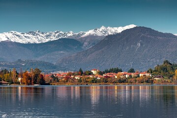 Autumn view of Varese lake in the pre-Alpine region in Lombardy, Italy - obrazy, fototapety, plakaty