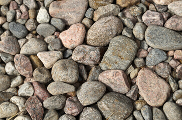 Close-up of gray and red rough natural mountain texture
