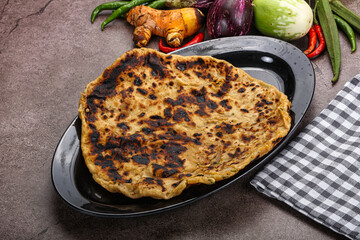 Indian cuisine stuffed Aloo paratha