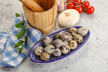 Raw quail eggs in the bowl