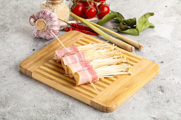Raw Enoki mushroom with bacon