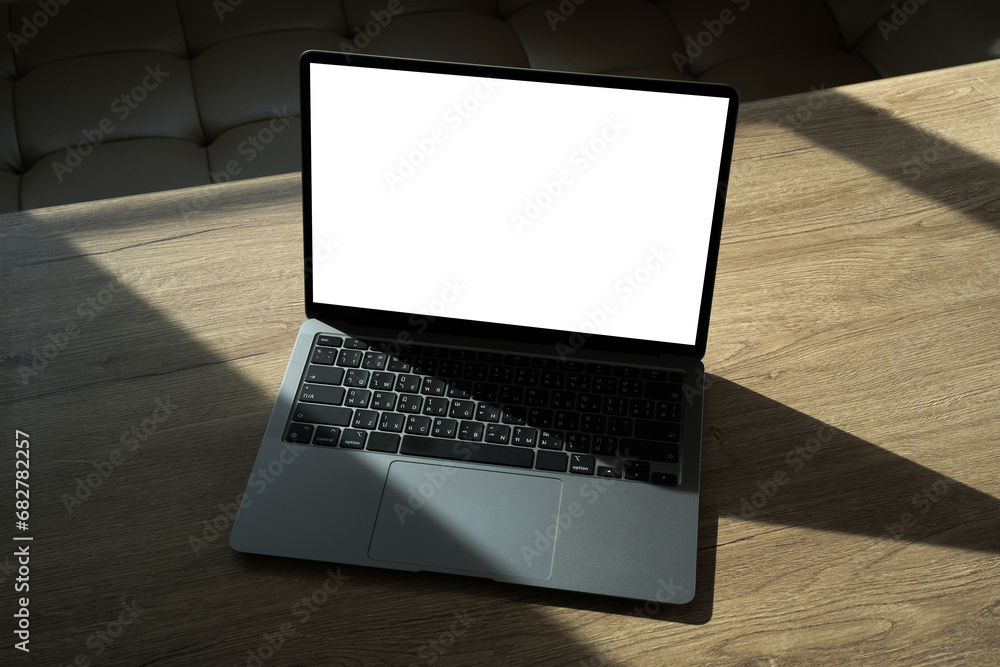 Poster laptop with blank screen on table. workspace background new project on laptop computer with blank co