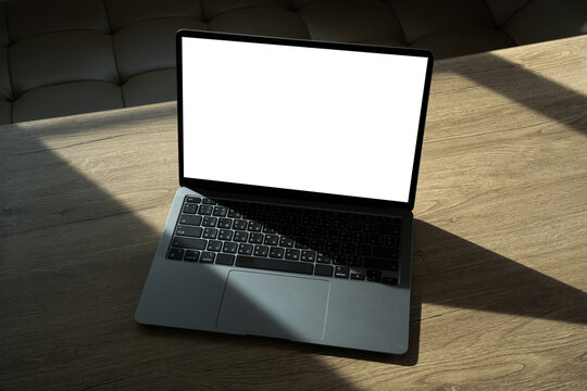 Laptop with blank screen on table. Workspace background new project on laptop computer with blank copy space screen for your advertising text message