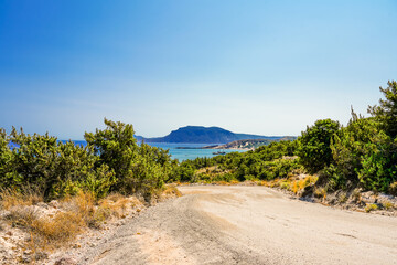 View of the landscape and the Mediterranean Sea from a mountain on the Greek island of Kos.	