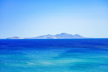 Fototapeta premium View of the landscape and the Mediterranean Sea from a mountain on the Greek island of Kos. 
