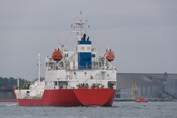 LPG TANKER - The red ship sails to port