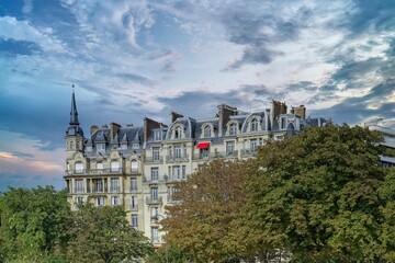 Historic Place de la Nation surrounded by foliage in the 11e district of Paris, France - obrazy, fototapety, plakaty