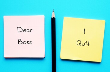 On blue background, pencil wrote on office notes DEAR BOSS I QUIT, concept of employee decides to leave work, quitting full time job - the great resignation - obrazy, fototapety, plakaty