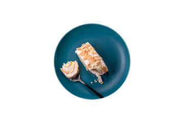 A piece of delicious sweet meringue roll with mascarpone cheese, berries and almonds