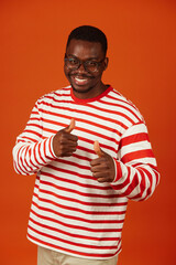 African-American man with thumbs up approving something