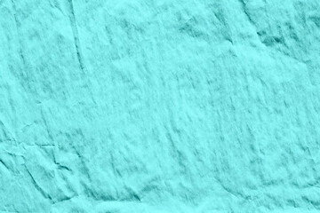 Macro closeup of blue crumpled paper texture