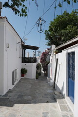 narrow street in village city, Skiathos, Greece.