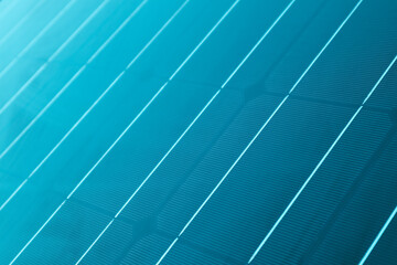Blue solar panel in selective focus as background. Solar Panel Pattern. Perspective and blur is used. Alternative clean green sustainable energy background